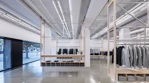 Several different logistical companies supply these services to suit the customers' needs. Clothing Racks Move Along Wheeled Tracks In La Store Reigning Champ