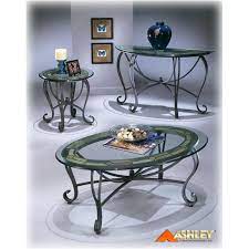 Incorporate a modern farmhouse accent into your living room with this cocktail table. T253 0 Ashley Furniture Danbury Oval Cktl Slate Mtl Glass Top