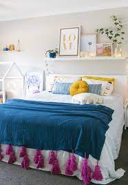 25+ versatile bedroom wall decor ideas that will add a touch of personality for the bookish type the overlapping square frames above the bed would seem to suit. 60 Above Bed Decorating Ideas What To Put On A Wall Above A Bed Apartment Therapy