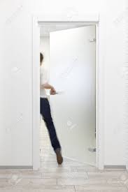 Frosted glass bathroom door white modern desk. Young Woman Entering A Room In Modern Office With Minimalist White Interior Through Frosted Glass Door Woman Is Motion Blurred Stock Photo Picture And Royalty Free Image Image 113610843
