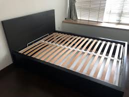 So we bought a queen instead thinking we'd upgrade her mattress at some point. Queen Size Storage Bed Ikea Malm Ottoman Bed And Hovag Mattress Furniture Home Living Furniture Bed Frames Mattresses On Carousell