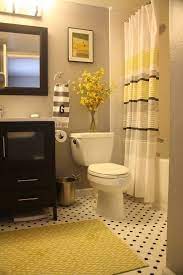 Pale yellow is a good choice for you if you want to use brown, beige, or gray elements in your bathroom. Black And White Tile Bathroom With Yellow And Gray Accents Gray Bathroom Decor Home Decor Yellow Bathrooms