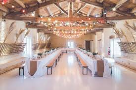 events venue banquet hall wedding party lights wood beams