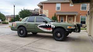 For Full-on Insanity You Cant Beat This 2007 Ford Crown Victoriawhen The Apocalypse Arrives Drive In Style Lifted Cars Ford Mustang Car Lifted Ford Trucks