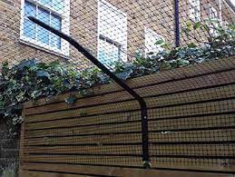 We use stronger, round tubular steel posts with deeper 30 ground sleeves for stability and snow/ice load concerns. Cat Fencing Catio World