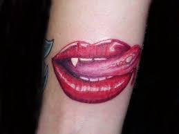 Bite The Bullet Tattoo Meaning 30 Incredible Lip Tattoos Kiss Lip Tattoos Lip Piercing Jewelry Tattoos