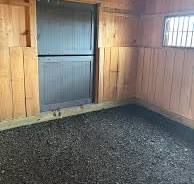 Concrete or rubber mats for horse stalls?