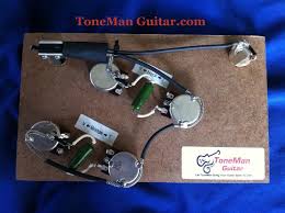 It's still a there's some swapping of pickup and switch wires at each of the volume pots and then it's mostly just a case of removing one capacitor and moving another. Gibson Epiphone Es335 Prebuilt Wiring Harness Kit