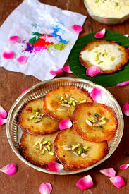 Malpua — sweet pancake soaked in syrup