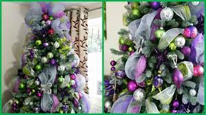 Scrunch decorative orange mesh into a fat ball for each pumpkin and overlay it with wide orange mesh ribbon in rounded vertical columns to mimic the ridges of a pumpkin globe. How To Decorate A Christmas Tree With Deco Mesh Deck The Halls Pt 3 Youtube