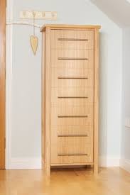 Close both doors and there is no reason to suspect anything but clothing lurks behind the doors. Stand Alone Gun Cabinets The Bespoke Gun Cabinets Company