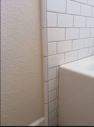 Quarter Round Trim Ending Tile To Wall In 2020 Bathtub Tile Tile Edge Bathroom Flooring