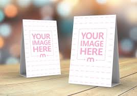 A Mockup Generator Featuring Two Standing Table Talkers On A Wooden Background Surface Upload Your Own Design And Preview Mockup Desk Mockup Generator Mockup
