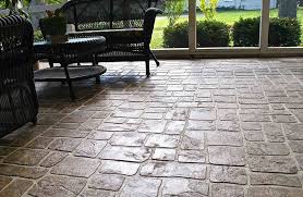 Concrete patios stamped with patterns cast from real wooden planks provide an authentic looking surface requiring minimal maintenance. Stamped Concrete Patio Design Ideas Designing Idea