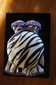 Belly Footprint Baby Shower Cake With Zebra Print Dress And Purple Detailing Baby Shower Cakes Zebra Baby Showers Footprints Baby Shower