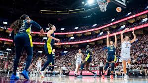 WNBA regular-season record crowd of 20,996 watches Wings beat Tempo in Montreal