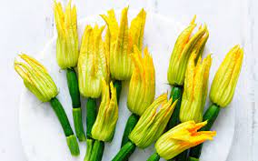 Harvest round zucchini when it's about the size of a billiard ball—there's a reason one of the most popular round zucchinis is called eight ball. zucchini plants produce both male and female flowers and are pollinated by bees and other insects. Sydney Markets Zucchini Flowers Delicate And Delicious