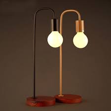 Item Type Table Lamps Brand Name Flybsw Shade Type Shadeless Shade Direction Down Technics Painted Body Material Iron Woo Table Lamp Wood Table Lamp Lamp