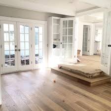 I Love The Wood Floors Open And Bright Design And Step Down Into This Room White Oak Hardwood Floors Home New Homes