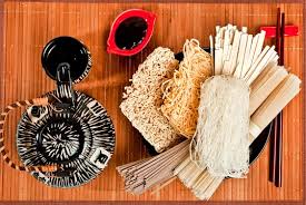 The bowl is always licked clean at potlucks! Different Bundles Of Uncooked Asian Noodles Udon Soba Ramen Rice And Glass Noodles In A Bowl With Chopsticks Soy Sauce And Teapot On A Bamboo Background Top View Stock Photo Adobe