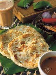 Roti canai with dial curry and teh tarik drink photos. Roti Canai And Teh Tarik Stock Photo Picture And Royalty Free Image Image 117717060