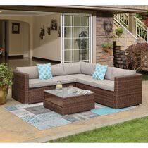 Table:water wave tempered glass top; Teal Outdoor Furniture Wayfair