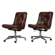 Tufted leather effect is contemporary and stylish and can be used in any room. Pair Of Gentilina Leather Swivel Desk Chairs By Strassle Switzerland 1960s 163476