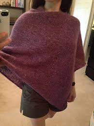 You can see the free pattern as well as a picture. Shortyssutures Easy Folded Poncho Ravelry