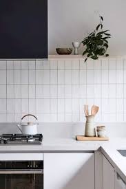 How can you pass up on this majestic white design? 102 Marvelous Kitchen Backsplash Remodel Ideas White Kitchen Splashback Kitchen Splashback Tiles Kitchen Splashback
