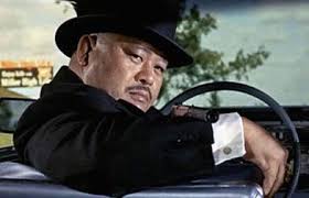 Use a box cutter or pair of scissors to cut out the 2 even rectangles, which will make up the center barrel of your top hat. Oddjob Wikipedia