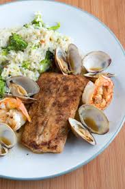 Pan Seared Mahi Mahi Clams Shrimp On A White Plate With Rice And Broccoli Seafood Recipes Clam Bake Clambake Recipe