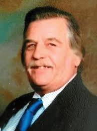Eric J. Wallis, 74