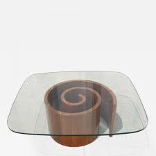 A fan of the adage form follows function, vladimir kagan made iconic furniture that seamlessly fused sleek design with the trappings of comfort. Vladimir Kagan Walnut Glass Snail Coffee Table By Vladimir Kagan