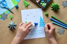 These cards have two panels that interlock with slots. Making Greeting Card With Origami 3d Xmas Tree From Paper Merry Christmas And Happy New Year Decoration Childrens Diy Concept Stock Photo Image Of Background Craft 124929248