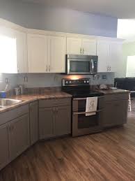 Two Tone Cabinets Done With Annie Sloan Chalk Paint Old White And Coco Annie Sloan Kitchen Cabinets Kitchen Cabinets Kitchen Cabinets Painted Grey