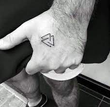 Top 87 Triangle Tattoo Ideas 2021 Inspiration Guide Tattoo On Hand For Men Tattoos Small Tattoos For Guys
