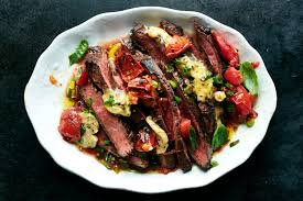 Start cooking flank steak by putting some olive oil on the grill. That Summer Grilling Standard Buttery Flank Steak The New York Times