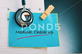 Word Medical Check Up On Notepad Calendar And Stestoscope Over Beautiful Rev Premium Photo 106646864 Medical Note Pad Words
