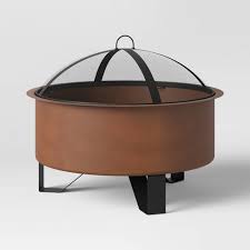 What outdoor bash is not improved by a fire feature? Round Rust Look Wood Burning Outdoor Fire Pit Threshold Target