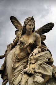a fairy monument in austria fantasy fairytale myth legend statue sculpture art statue angel sculpture cemetery angels