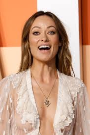 Olivia Wilde goes braless in totally see-through lace dress at Vanity Fair  Oscars party after debuting new boyfriend
