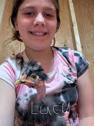 Introduction and photo of granddaughter with chickens