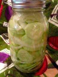 Pickled cucumbers with vinegar and sugar. Cucumbers And Onions 2 Cups Sugar 1 Cup White Vinegar 1 Cup Water Mix And Warm On Stove Til Sugar Is Me Cucumbers And Onions Cucumber Recipes Pickling Recipes
