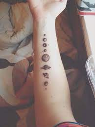 12 Beautifully Minimal Astronomy Inspired Tattoos Cosmic Tattoo Planet Tattoos Tattoos