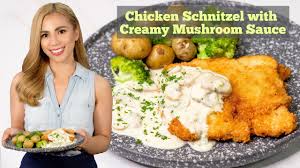 A schnitzel is a thin slice of meat. Chicken Schnitzel With Creamy Mushroom Sauce Youtube