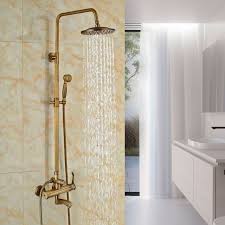 Clawfoot bathtubs have been around since the late 1800's and have always been considered a luxury. Juno Antique Brass Rain Shower System With Handheld Shower Faucet