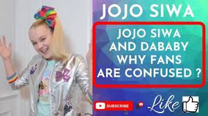 The jojo siwa reference takes place at the 1:04 junction, where dababy says the following line several memes were directed at dababy's height, believed to be 57, while jojo siwa stands at 59. O0ck Sdotuzgtm