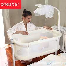 A bedside crib fastens to the frame of your bed on one side, so you're effectively lying next to your baby, but not sharing a sleep surface or bedding. Wooden Crib Side Bed Multi Functional Portable Roller Splice Queen Bed Kids Beds Baby Cradle Baby Cribs Aliexpress