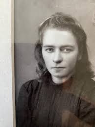 Having lunch with the Swedish/Finnish relatives in the market place in  Vassa, Finland 1958. Mom, in the chair with the red backing is wearing a  polka dot dress.