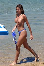 Hot amateur milf gets a rich cumshot. Hot Amateur Milf Photographed Topless At Beach